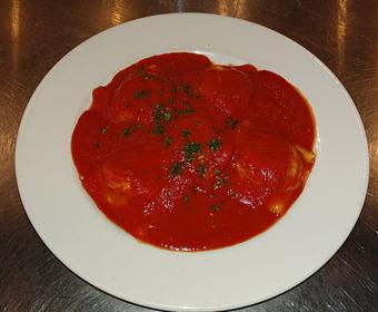 Product: Homemade meat ravioli with tomato sauce - Pazzo Pomodoro in Vienna, VA Italian Restaurants