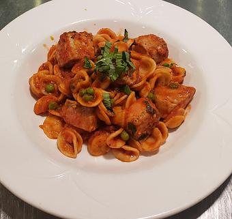 Product: Ear shaped pasta in a spicy tomato sauce with tuna and peas - Pazzo Pomodoro in Vienna, VA Italian Restaurants