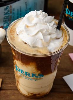 Product: Vanilla shake with a shot of espresso poured on top.  Can have any Special Combo or single flavor added to it. - Perks Coffee Shop & Cafe in Gulfport, MS Bakeries