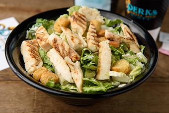 Product: Caesar Salad with Chicken. - Perks Coffee Shop & Cafe in Gulfport, MS Bakeries