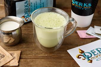 Product: Flower Child - Add Lavendar, milk and honey to your green tea matcha! - Perks Coffee Shop & Cafe in Gulfport, MS Bakeries