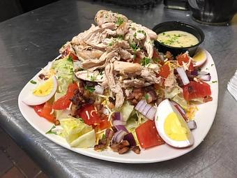 Product: Big Cluckin Salad with in-house smoked chicken - Phoebus Dive Bar in Hampton, VA Bars & Grills