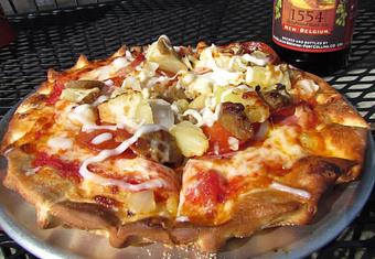 Product: Meat Trio Pizza - Picasso Brothers Cafe & Espresso in Centralia, WA American Restaurants