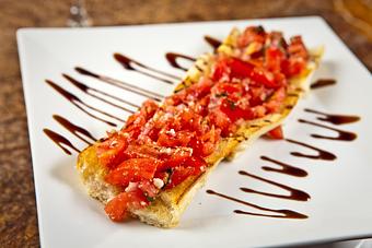 Product: Tomato, Gorgonzola, Onion,Olive Oil & Balsamic Glaze on Sliced Bread - Piezanos Pizza and Pasta in Boca Raton, FL Italian Restaurants