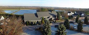 Product: Aerial View of the Pine Tree Barn, overlooking the Killbuck Valley and family Christmas Tree Farm. - Pine Tree Barn in Wooster, OH American Restaurants
