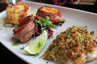 Product: parmesan salmon with garlic aioli, pistachio encrusted grouper, and prosciutto wrapped scallops. - Plate & Barrel in Sun Prairie, WI Tapas Bars