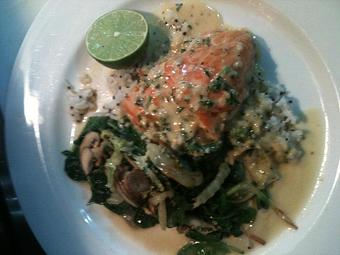 Product: Grilled Salmon served over a bed of saute spinach - Plaza Grill in Marathon, FL American Restaurants
