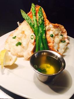 Product: Served with Asparagus and Baked Potato - Plaza Grill in Marathon, FL American Restaurants