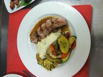 Product: Mustard and Maple Glazed Pork Tenderloin served with 
Mashed Potatoes and A Vegetable Medley - Ports Of Call in Downtown Historic Southport - Southport, NC Bars & Grills
