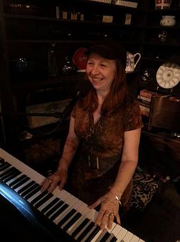 Product: Lisa Rankin performing at our Hump Day Soiree on Wednesdays. - Ports Of Call in Downtown Historic Southport - Southport, NC Bars & Grills