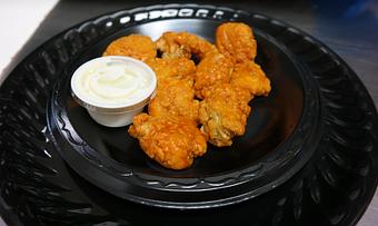 Product: Boneless Chicken Chunks with Hot Sauce. Also available in many other sauces, or plain. - Powerhouse Pizza in Camden, OH American Restaurants