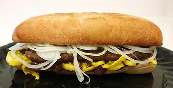 Product: Mushroom Steak Sub with mushroom gravy, cheese, banana peppers, and onions. - Powerhouse Pizza in Camden, OH American Restaurants