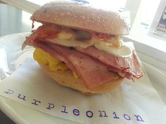 Product: scrambled eggs, provolone, sun-dried tomato mayo and choice of breakfast meat - Purple Onion Cafe in Los Gatos / Campbell border - Los Gatos, CA American Restaurants