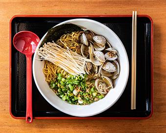 Product: classic chicken broth, pastaneck clams, beech mushrooms, scallions, fried garlic, oregano - Ramen San in Chicago, IL Japanese Restaurants