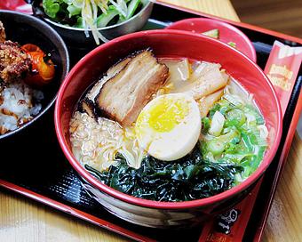 Product: our most traditional ramen. Rich and hearty pork broth, tokyo wavy noodles, green onion, pork belly, wakame sewaweed, molten egg, bamboo shoots, fried garlic and sesame seeds - RAMEN-SAN Whisky Bar in Fulton Market - Chicago, IL Japanese Restaurants