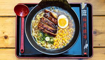 Product: rich chicken broth, chicken chashu, buttered corn, green onion, molten egg, nori - RAMEN-SAN Whisky Bar in Fulton Market - Chicago, IL Japanese Restaurants