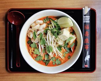 Product: a ramen inspired by southeast asian flavors, laksa features an herbaceous and creamy chicken broth, topped with curry poached shrimp and crispy tofu, finished with cucumber, bean sprouts, fresh herbs, and a squeeze of lime - RAMEN-SAN Whisky Bar in Fulton Market - Chicago, IL Japanese Restaurants