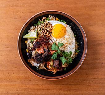 Product: roasted chashu, spicy kimchi, buttered corn - RAMEN-SAN Whisky Bar in Fulton Market - Chicago, IL Japanese Restaurants