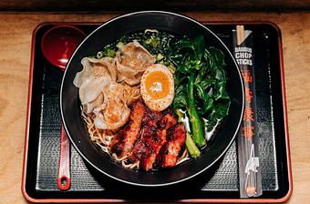 Product: Through our collaboration with 3 Little Pigs, this classic Cantonese Wonton Noodle Soup features a vegetable and fish broth, tender slices of the Glazed Char Siu barbecue pork, our house made shrimp and pork wontons, gai lan, and a marinated molten egg. - RAMEN-SAN Whisky Bar in Fulton Market - Chicago, IL Japanese Restaurants