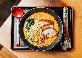 Product: Through our collaboration with sun wah bbq, this ramen features a spicy miso broth, tender slices of crackling pork belly, old-world style marinated tofu, bean sprouts, and gai lan. - RAMEN-SAN Whisky Bar in Fulton Market - Chicago, IL Japanese Restaurants