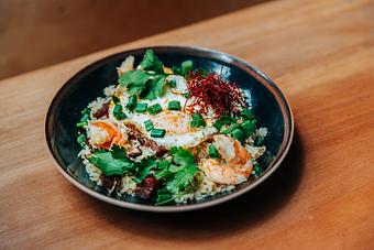 Product: juicy shrimp and savory sous vide bacon fried with a touch of cilantro and topped with a fried egg, scallions, chili threads and lime - RAMEN-SAN Whisky Bar in Fulton Market - Chicago, IL Japanese Restaurants