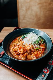 Product: spicy poached shrimp with a spicy miso and tomato chicken broth topped with cabbage, radish, onion, cilantro and lime - RAMEN-SAN Whisky Bar in Fulton Market - Chicago, IL Japanese Restaurants