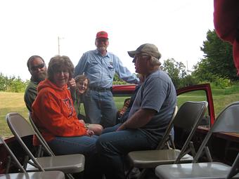Product: Market staff load up for a farm tour; Dave (standing) is tour guide! - Rennhack Orchards Market in Hart, MI Fruit & Vegetables