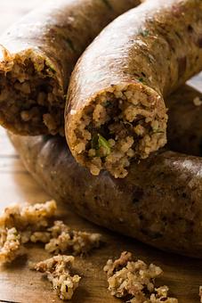 Product: We take our jambalaya, add some extra seasoning and spices, and stuff it in a casing so you can easily eat it on the go! - Rice & Roux in Baton Rouge, LA American Restaurants