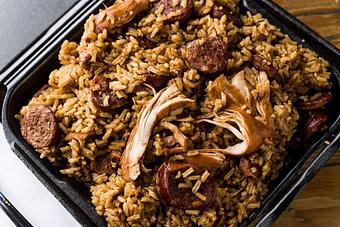 Product: Your choice of jambalaya to feed 2 people (includes 2 rolls) - Rice & Roux in Baton Rouge, LA American Restaurants