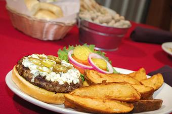Product: This is our jalapeño burger with bleu cheese crumbles added - Rodeo Steakhouse & Grill in Coos Bay, OR Steak House Restaurants