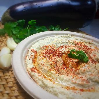 Product: Eight oz cup charbroiled eggplants with tahini, Lemon juice, garlic and olive oil, served with two pitas - Rosemary Grill in Los Angeles, CA Mediterranean Restaurants