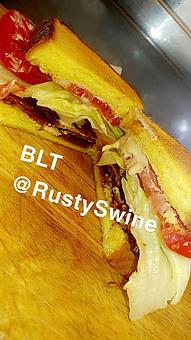 Product: Applewood smoked bacon with tomato, lettuce, baked bean mayo on Texas Toast - Rusty Swine in New Basin Distilling Company - Madras, OR American Restaurants