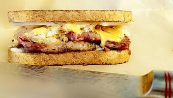 Product: Corned Beef with sauerkraut, swiss cheese, thousand island on toasted Rye - Rusty Swine in New Basin Distilling Company - Madras, OR American Restaurants