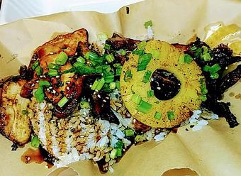 Product: Sticky white rice with sticky chicken thigh and more Aloha sauce, grilled pineapple, furikake (seasoning) and green onions - Rusty Swine in New Basin Distilling Company - Madras, OR American Restaurants