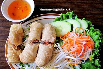Product: Vietnamese pork egg rolls served with fresh lettuce and house sauce (Add 1 roll, plus $1.75) - Saigon Wings Restaurant in Colorado Springs, CO Vietnamese Restaurants