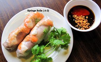 Product: Cooked slice pork &shrimp with rice noodles and variety of fresh vegetable all wrapped in rice paper with house sauce - Saigon Wings Restaurant in Colorado Springs, CO Vietnamese Restaurants