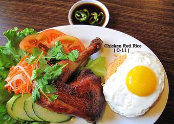 Product: Deep fried marinated cage-free chicken.  Serve with special rice and house salad - Saigon Wings Restaurant in Colorado Springs, CO Vietnamese Restaurants