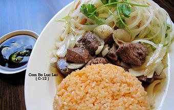 Product: Stir-fried cubed beef tenderloin with special sauce.  Serve with special rice & house salad - Saigon Wings Restaurant in Colorado Springs, CO Vietnamese Restaurants