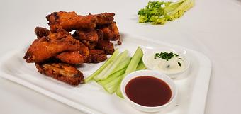 Product: Slow roasted, deep fried and sauced to perfection. Served with a side of Celery and Blue Cheese Sauce.
Choose your style: Sweet and Spicy Gold BBQ, Mild, Jerk Dry Rub, Honey BBQ - Samarkand Restaurant in Feasterville - Feasterville Trevose, PA Seafood Restaurants