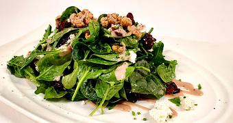 Product: Baby Spinach tossed with Goat Cheese, Sun dried Cherries, candied Walnuts and Balsamic Vinaigrette - Samarkand Restaurant in Feasterville - Feasterville Trevose, PA Seafood Restaurants