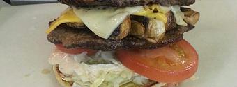 Product: The TRIPLE B BURGER is the KING of ALL BURGERS!!!  We combine 1/2 pound of beef with smokey bacon, sauteed mushrooms, chipolte ranch, tomatoes, and so much more. If you're hungry and want to try our Biggest, Baddest, Best go for the TRIPLE B. - Sandi's Drive Inn in Richfield, UT Hamburger Restaurants