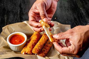 Product: Fried Mozzarella Sticks - Saranello's in Wheeling, IL Italian Restaurants