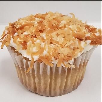 Product: Vanilla cupcake with toasted coconut buttercream icing - Saweet Cupcakes in San Antonio, TX Dessert Restaurants