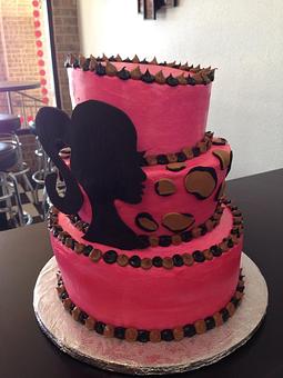 Product: Special order birthday cake with fondant silhouette and leopard spots on middle tier - Saweet Cupcakes in San Antonio, TX Dessert Restaurants