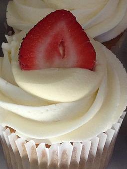 Product: Cheesecake Filled Vanilla Cupcake - Saweet Cupcakes in San Antonio, TX Dessert Restaurants