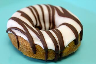 Product: Gluten Free Allergy Friendly Zebra Striped Dount!  Call or go online today for your fresh baked Gluten Free Goodness! (714) 968-9169, www.SensitiveSweets.com - Sensitive Sweets Dedicated Gluten Free Bakery in Fountain Valley, CA - Fountain Valley, CA Bakeries