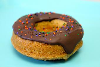 Product: Gluten Free Allergy Friendly Vanilla with Chocolate Frosting Donut!  Call or go online today for your fresh baked Gluten Free Goodness! (714) 968-9169, www.SensitiveSweets.com - Sensitive Sweets Dedicated Gluten Free Bakery in Fountain Valley, CA - Fountain Valley, CA Bakeries