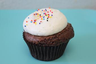 Product: Gluten Free Allergy Friendly Chocolate with Vanilla Frosting Cupcake!  Call or go online today for your fresh baked Gluten Free Goodness! (714) 968-9169, www.SensitiveSweets.com - Sensitive Sweets Dedicated Gluten Free Bakery in Fountain Valley, CA - Fountain Valley, CA Bakeries