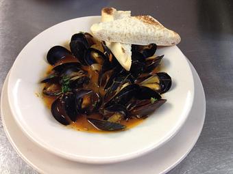 Product: PEI Mussels in a spicy tomato sauce - Sir Edmond Halley's in Myers Park - Charlotte, NC Hamburger Restaurants