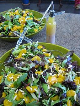 Product: Mandarin Orange Almond Salad (platted for a catering) with Dijon Vinaigrette - Sirens Cafe & Custom Catering in Kingman, AZ American Restaurants